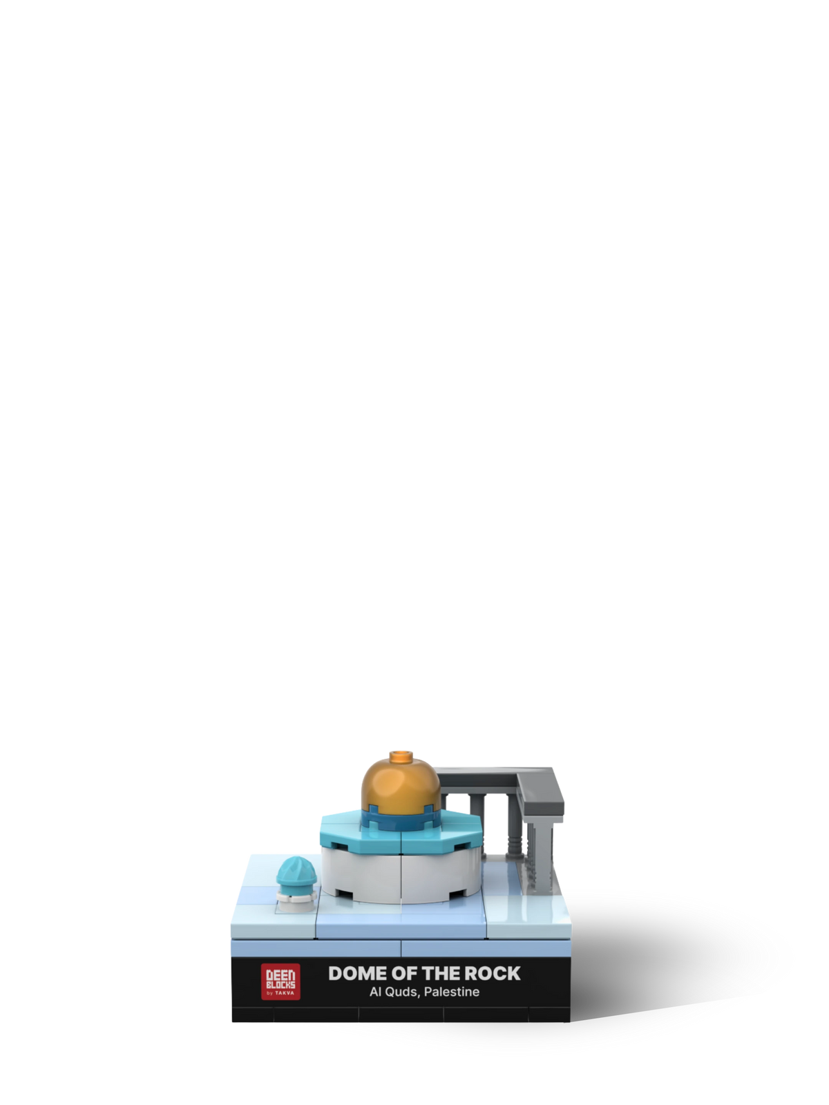Front view of the Dome of the Rock mini building blocks model, with its golden dome on a turquoise octagon, grey pillared arcade and the small Dome of the Chain above a black nameplate reading Dome of the Rock, Al Quds, Palestine