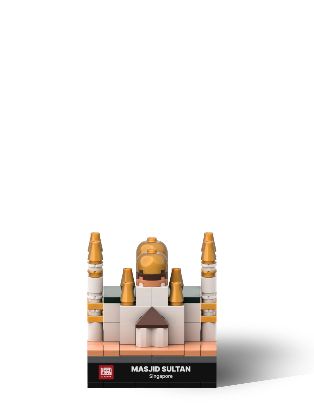 Front view of the Masjid Sultan mini building blocks model, with golden onion domes, white walls, gold-tipped minarets and a pitched entrance above a black nameplate reading Masjid Sultan, Singapore