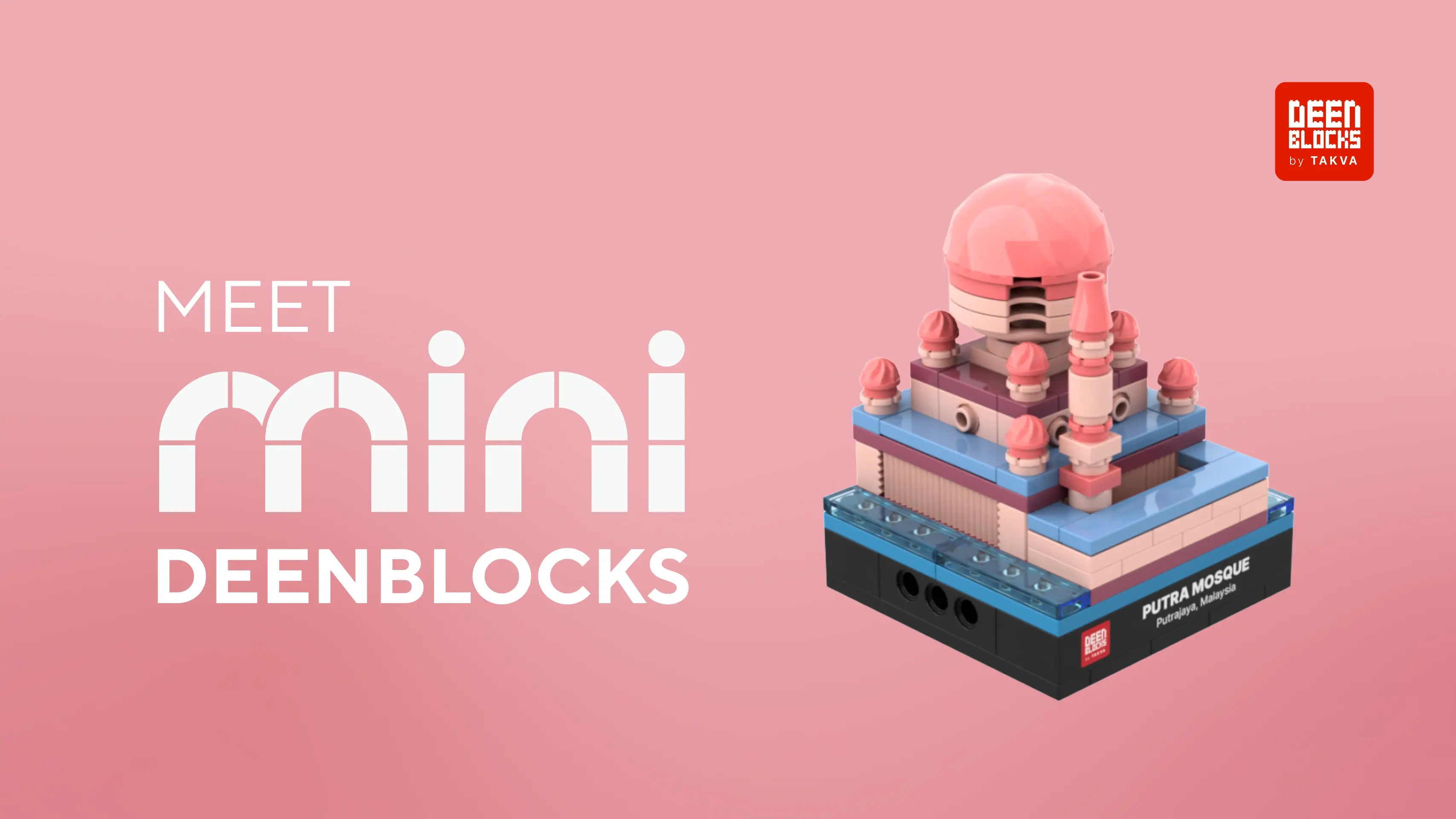 Meet Mini DEENBLOCKS: Putra Mosque mini building blocks model with its pink main dome, rose-coloured small domes and minaret above a blue lakeside base, on a black display base labeled Putra Mosque, Putrajaya, Malaysia