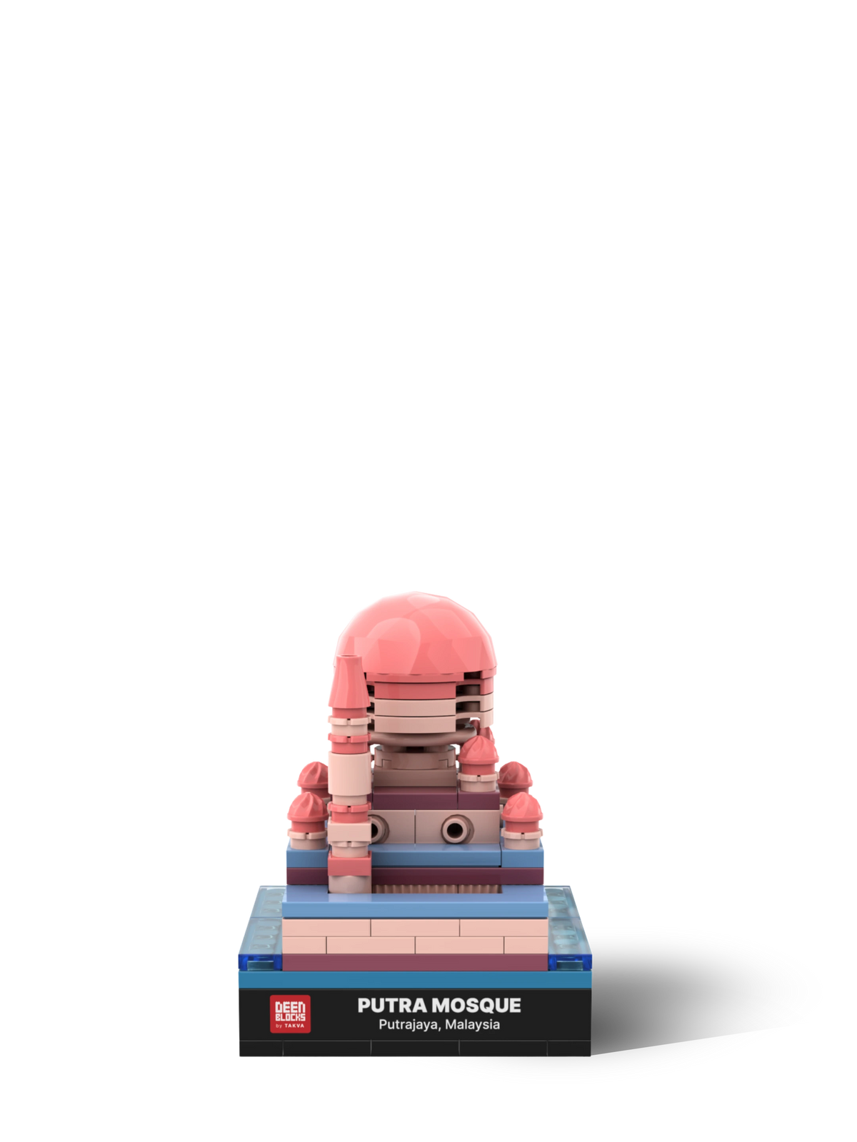 Front view of the Putra Mosque mini building blocks model, with its pink main dome, rose small domes and minaret on a blue lakeside base above a black nameplate reading Putra Mosque, Putrajaya, Malaysia